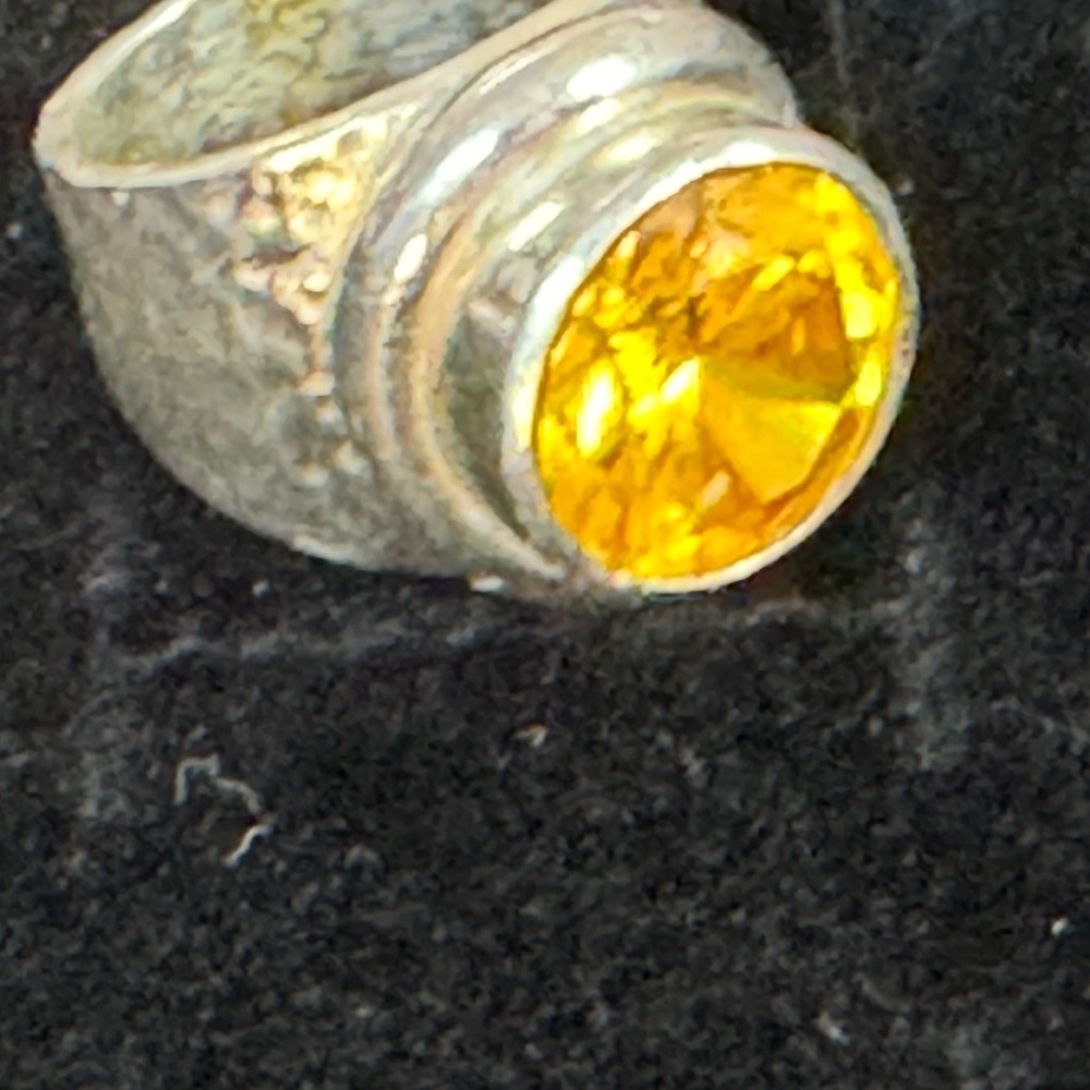 Radiant Silver Ring with Golden Yellow Gemstone